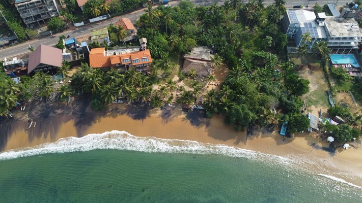 Aerial view of sea and beach at The Slow, Mirissa, Sri Lanka